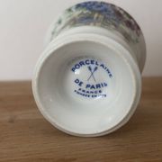 Adorable small porcelain vase from Paris with floral decoration.