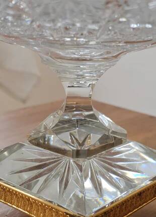 Cut crystal bowl on a brass base in bohemian style.