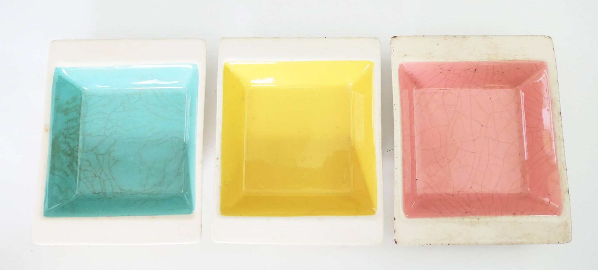 Set of three German ceramic catchalls from the 1950s.