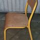 Pair of school chairs, wood and yellow metal, industrial decor.