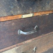 Large wooden workshop cabinet with 16 drawers, antique from the early 1900s.