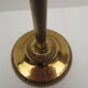 Old ashtray on foot year 50 in gilded brass