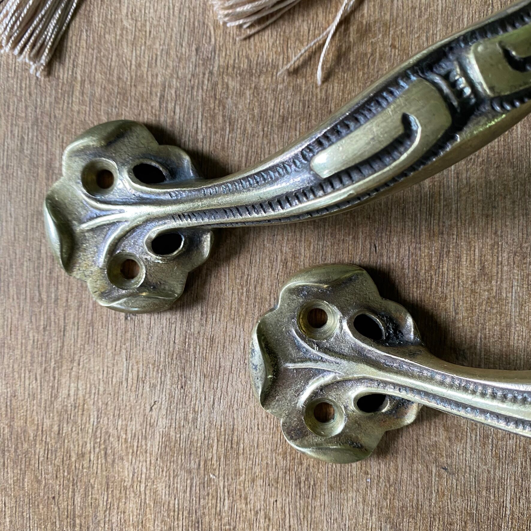 Pair of antique Art Nouveau brass handles