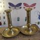 Vintage candlesticks with gilded brass pushers