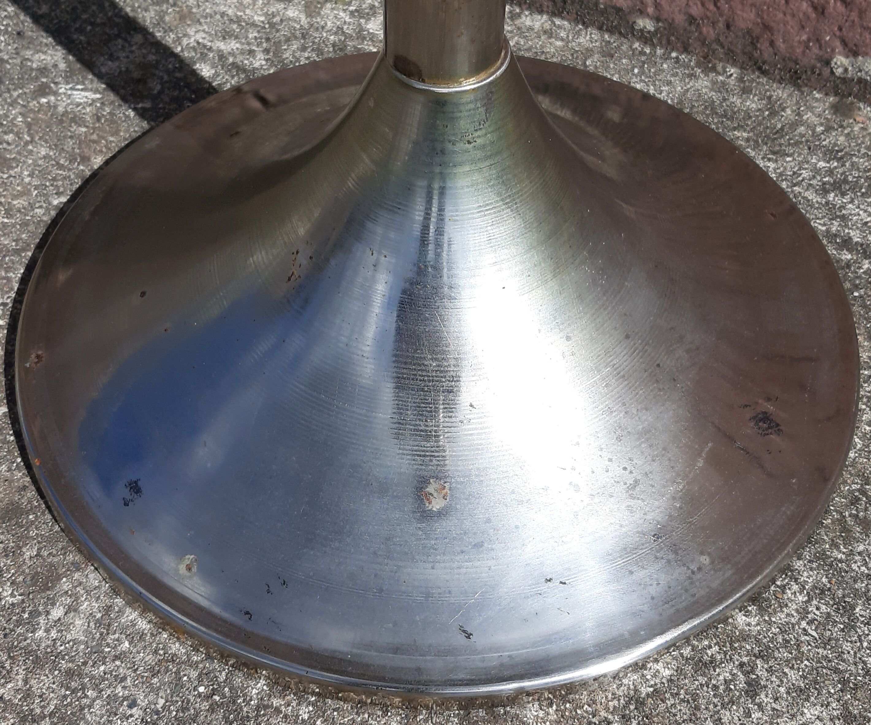 Golden metal selette on marble