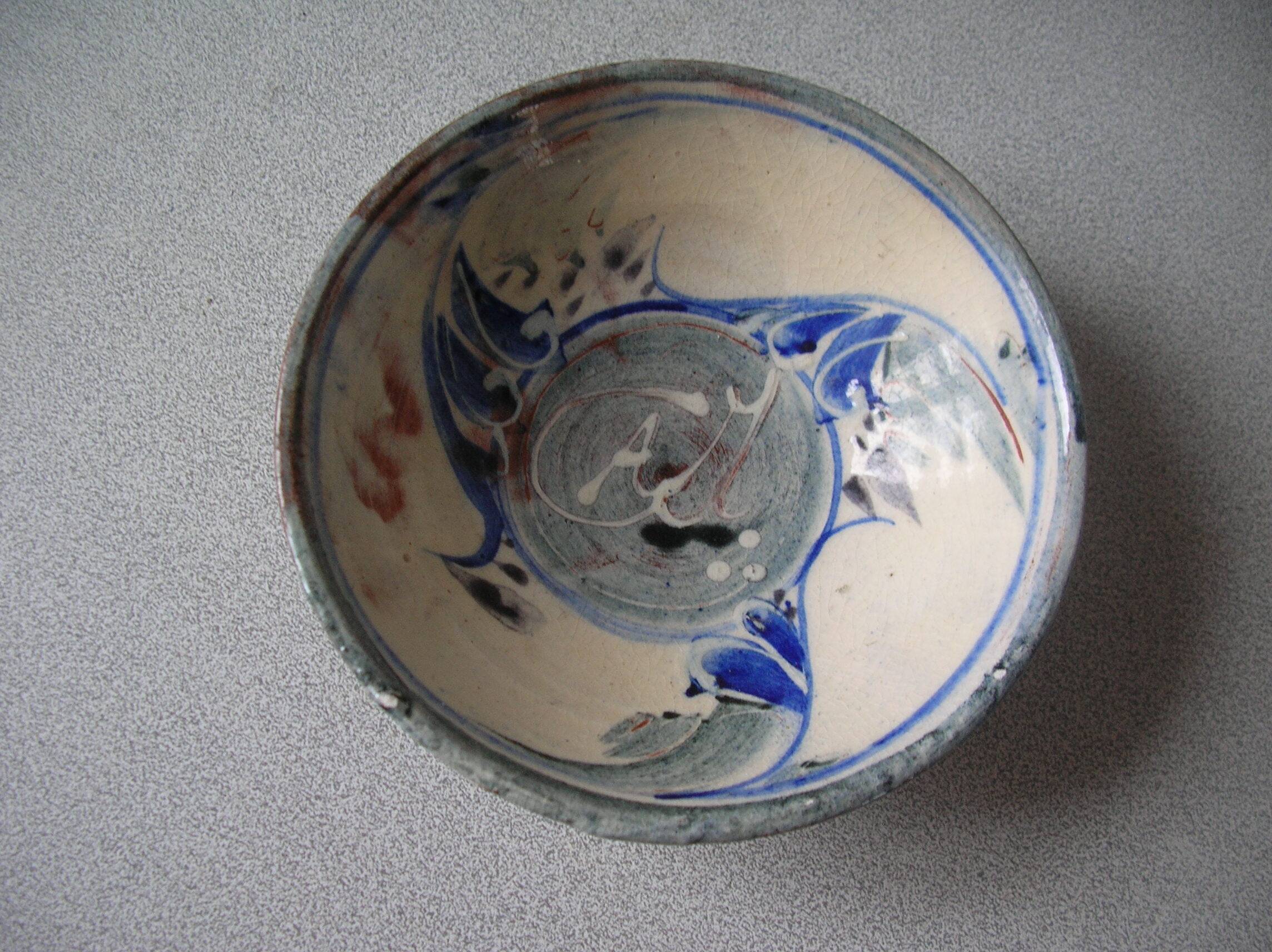 Old small bowl in enamelled terracotta, old earthenware