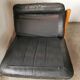Pair of designer leather armchairs 80s
