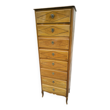 A seven-day chest of drawers in solid cherry wood with ebony stringing, 18th century