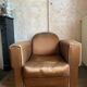 Vintage club armchair in brown fabrics to restore