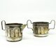 Set of sugar bowl and milk jug, neoclassicism with art deco influences, silver-plated brass, Belgium, 1930s.