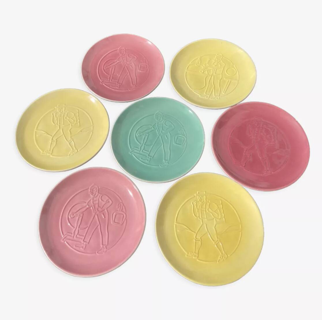 7 multicolored plates with old Nyon porcelain trades