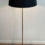 Lampadaire de parquet en laiton et piètement tripode à pieds griffes de la Maison Jansen