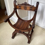 Gothic Curule Dagobert armchair in carved walnut, 19th century