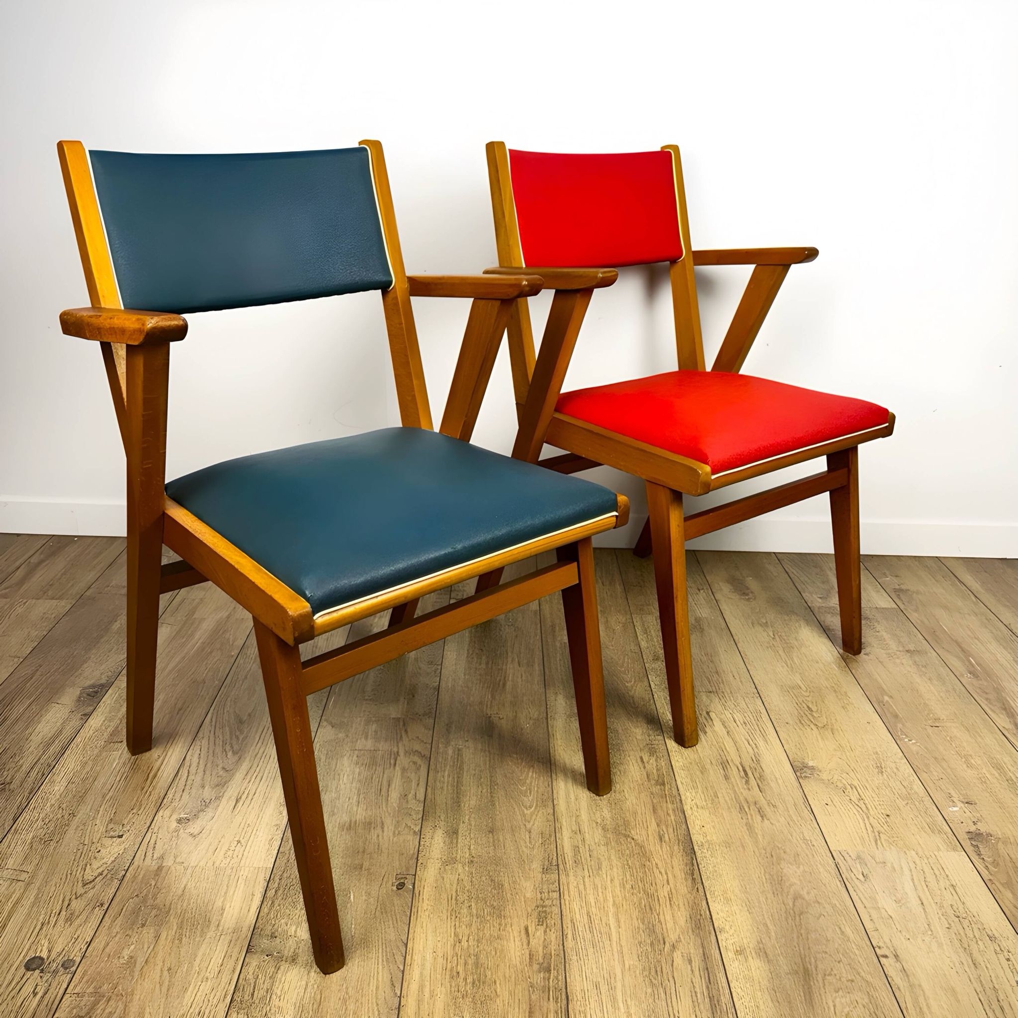 Pair of Scandinavian bridge armchairs in wood and vinyl from the 1950s.