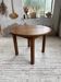 Table ronde en chêne 1950