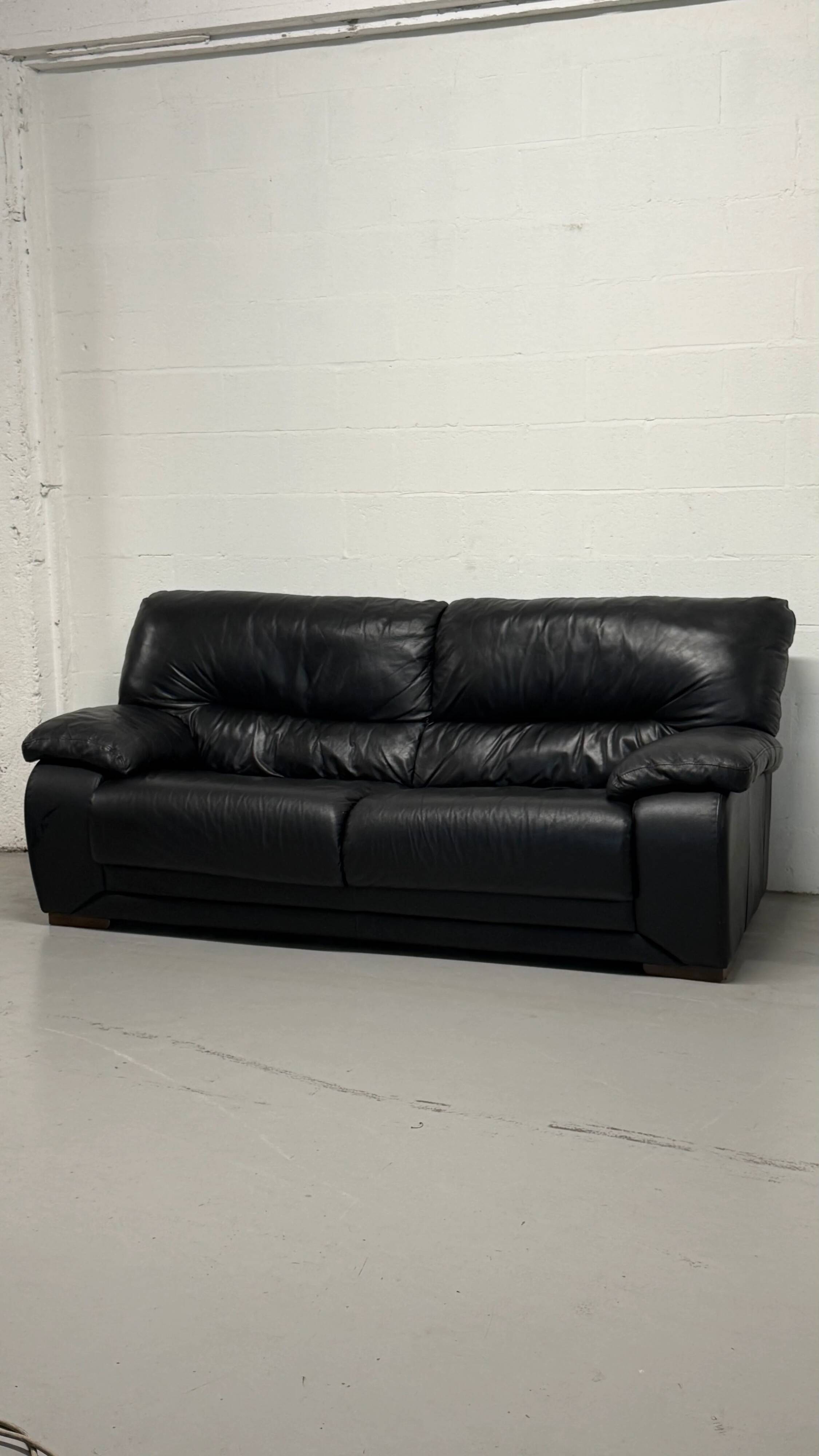 Black leather sofa — Italian postmodern design
