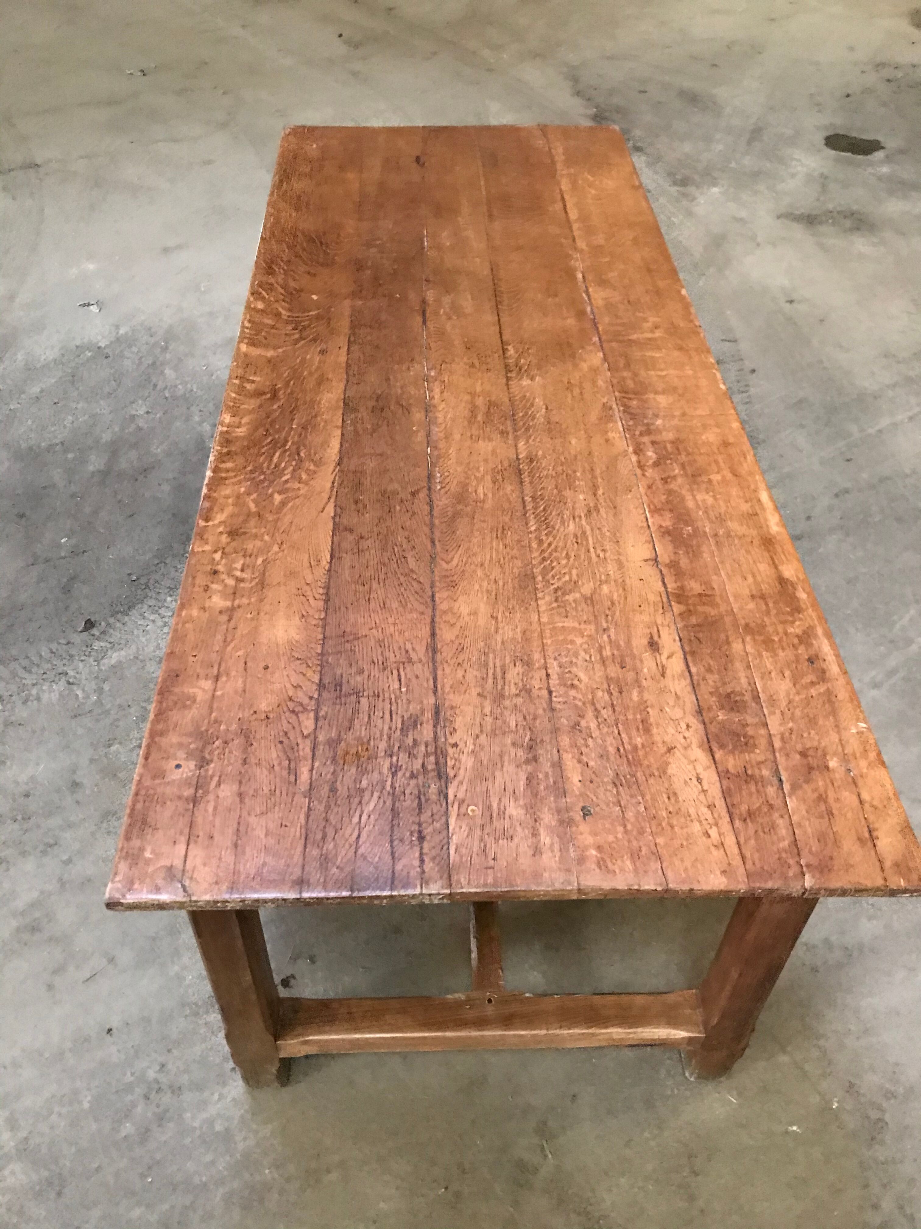 Old oak farm table in crisscross