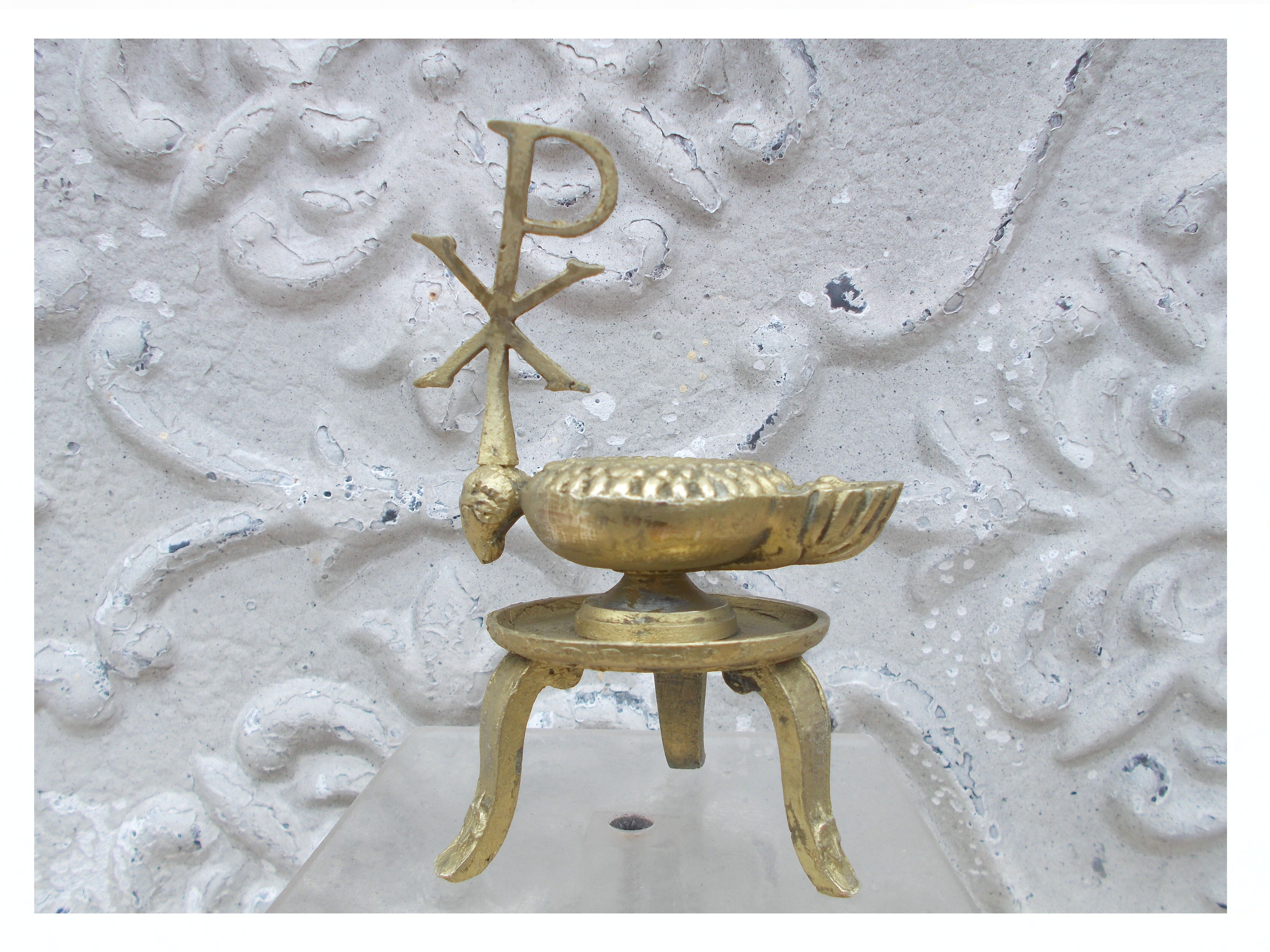 Old bronze oil lamp religious symbol Christ