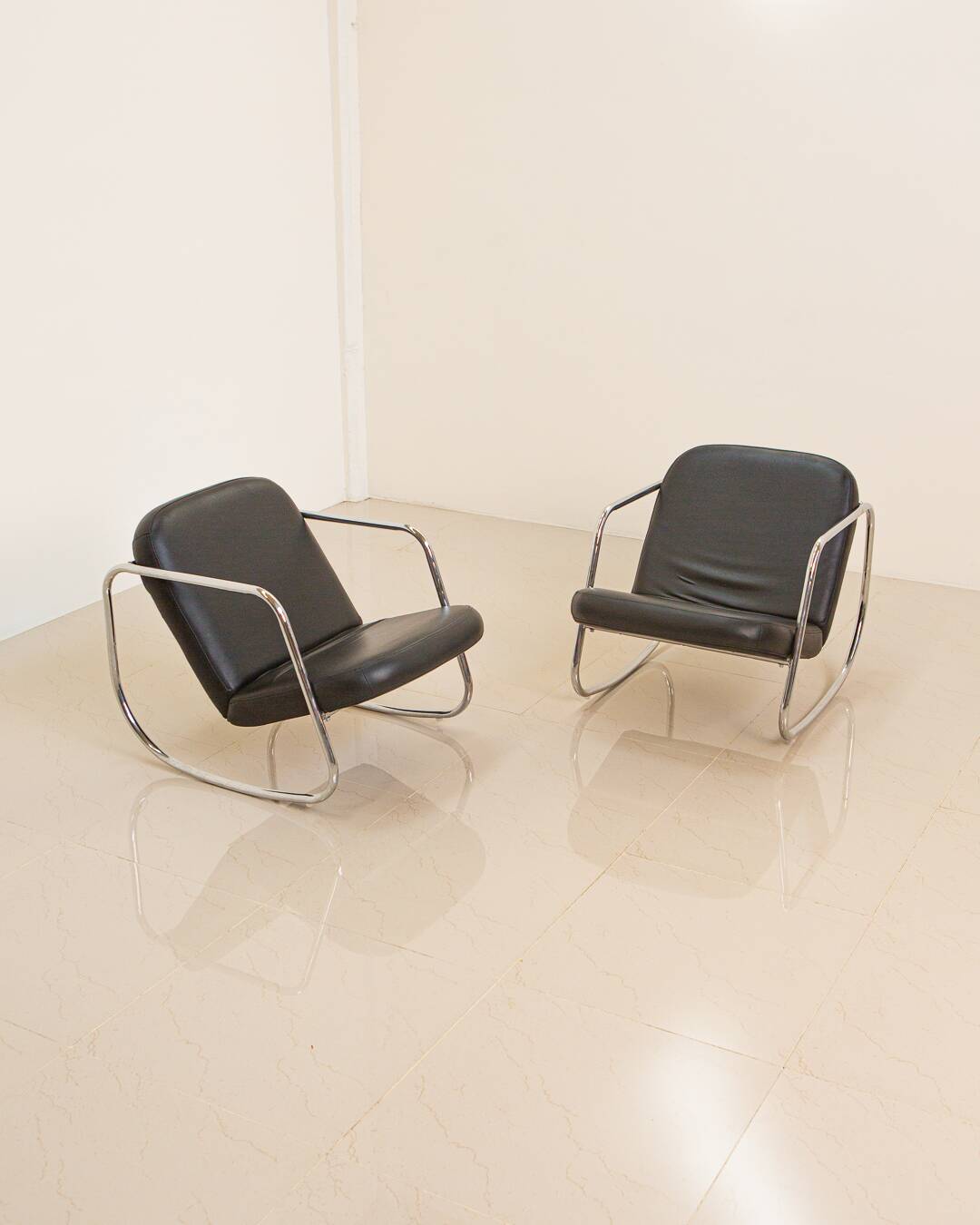 Pair of 60's "Rocking chair" lounge chairs