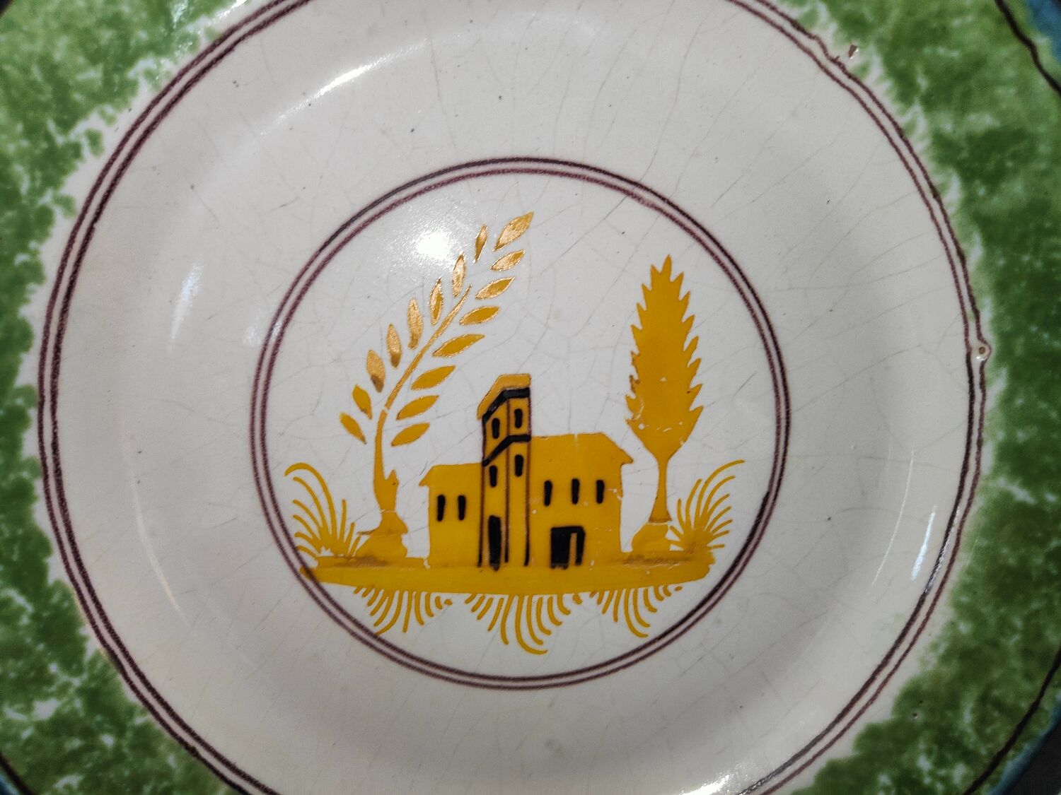Nevers earthenware plate? XIXth Century with palace decoration