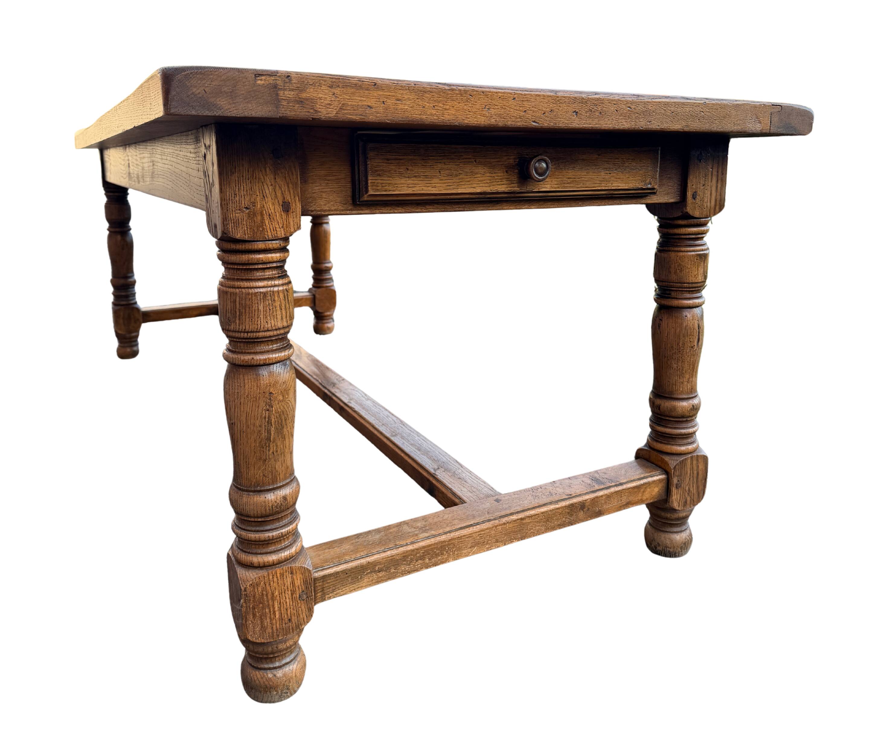 Large farmhouse table made of solid wood.