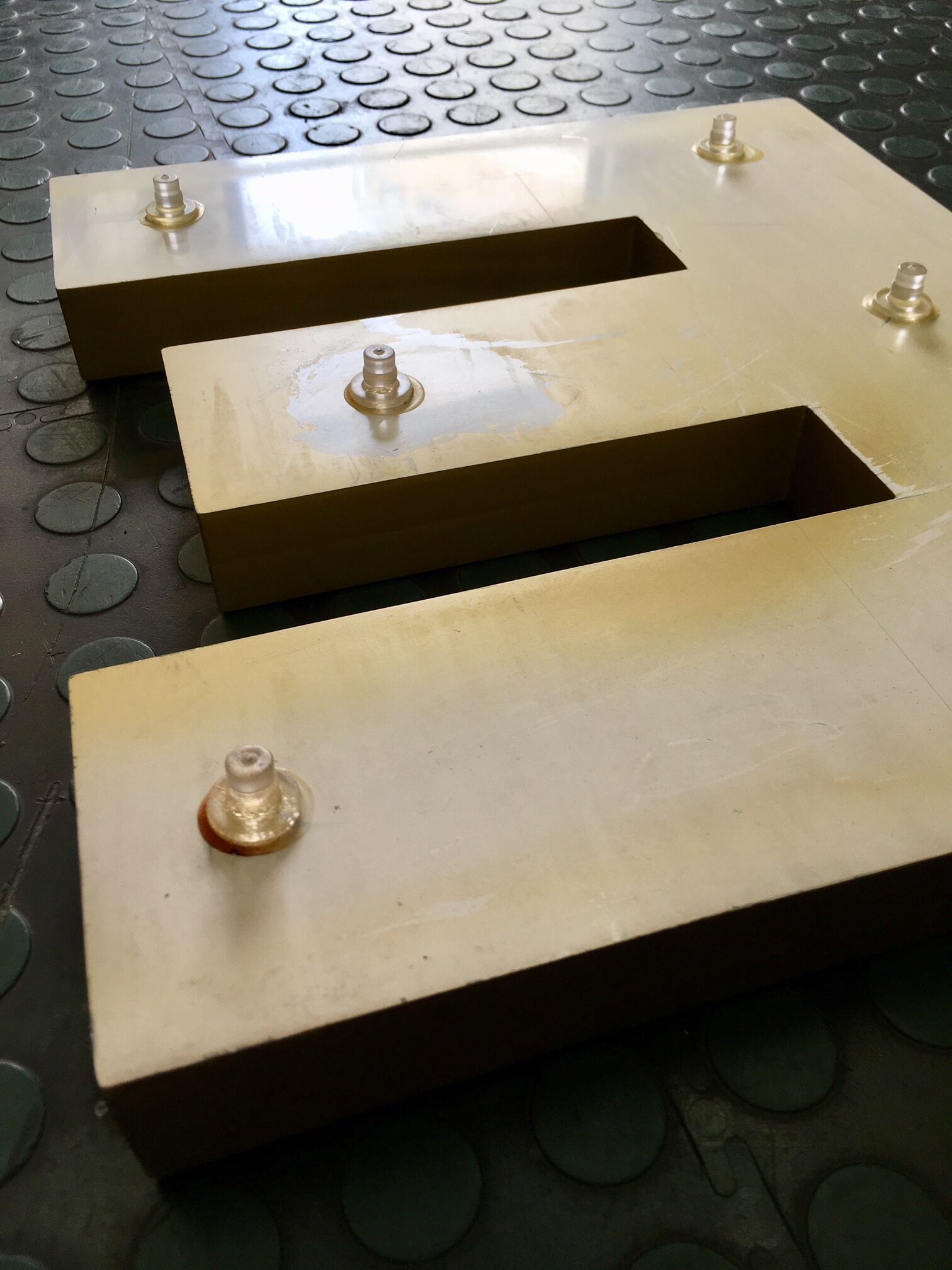 Golden sign letter E