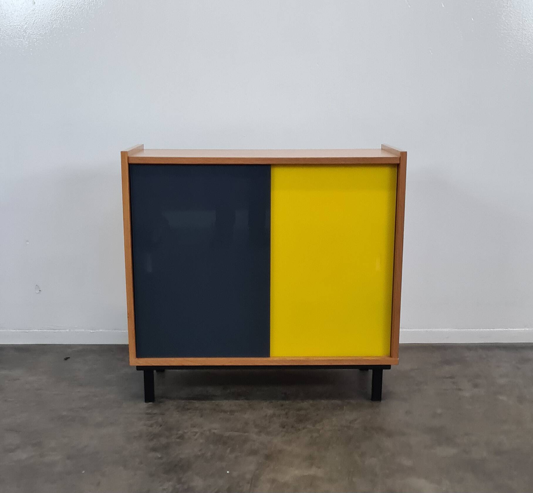 Vintage furniture with coloured glass.