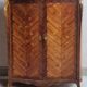 Louis XV style linen cabinet with marquetry and bronze, late 19th century.