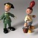 Set of 2 vintage GOULA wooden toy figurines with spring.