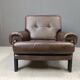 Pair of leather armchairs made in Denmark, 1960s