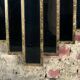 Art deco style "miami" mirror in patinated gilded wood 80x52cm