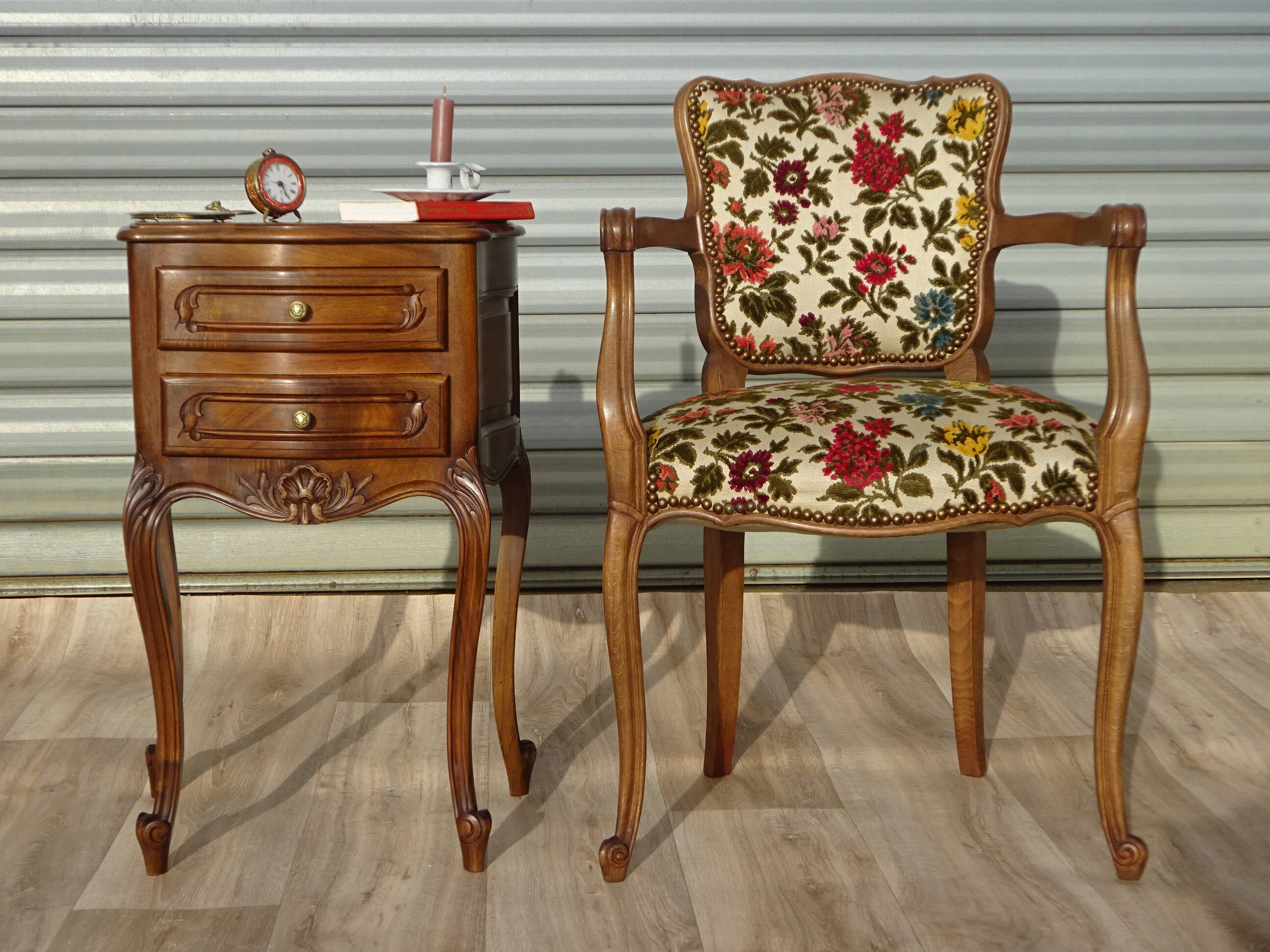 Convertible armchair with brocade fabric and floral patterns.