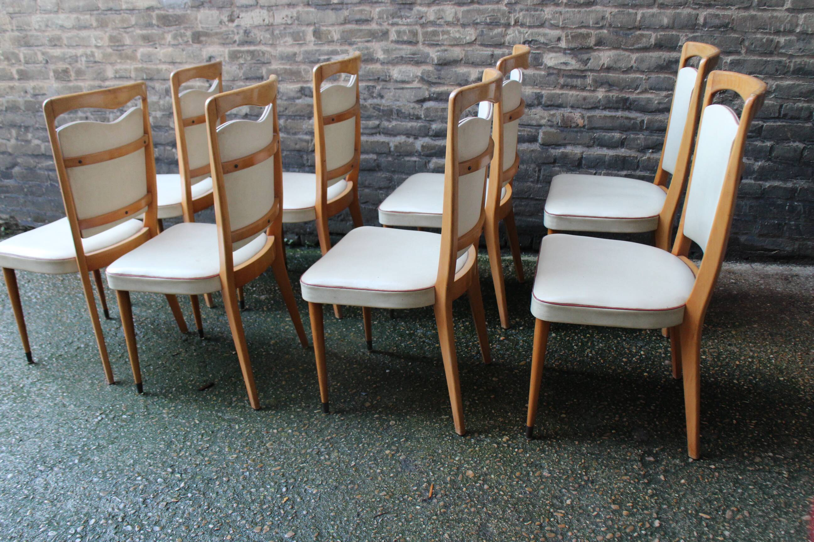 series of 8 vintage skai and wood chairs