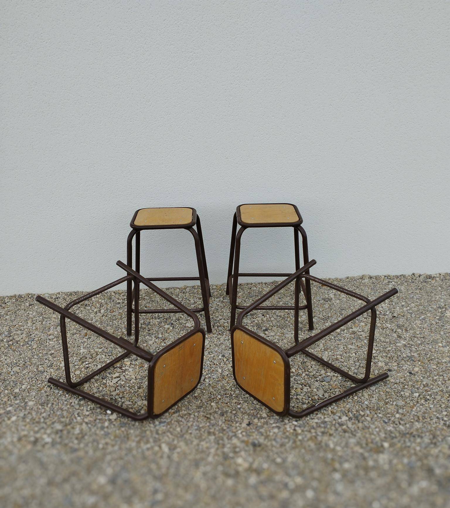 4 vintage stackable workshop stools from Mullca.