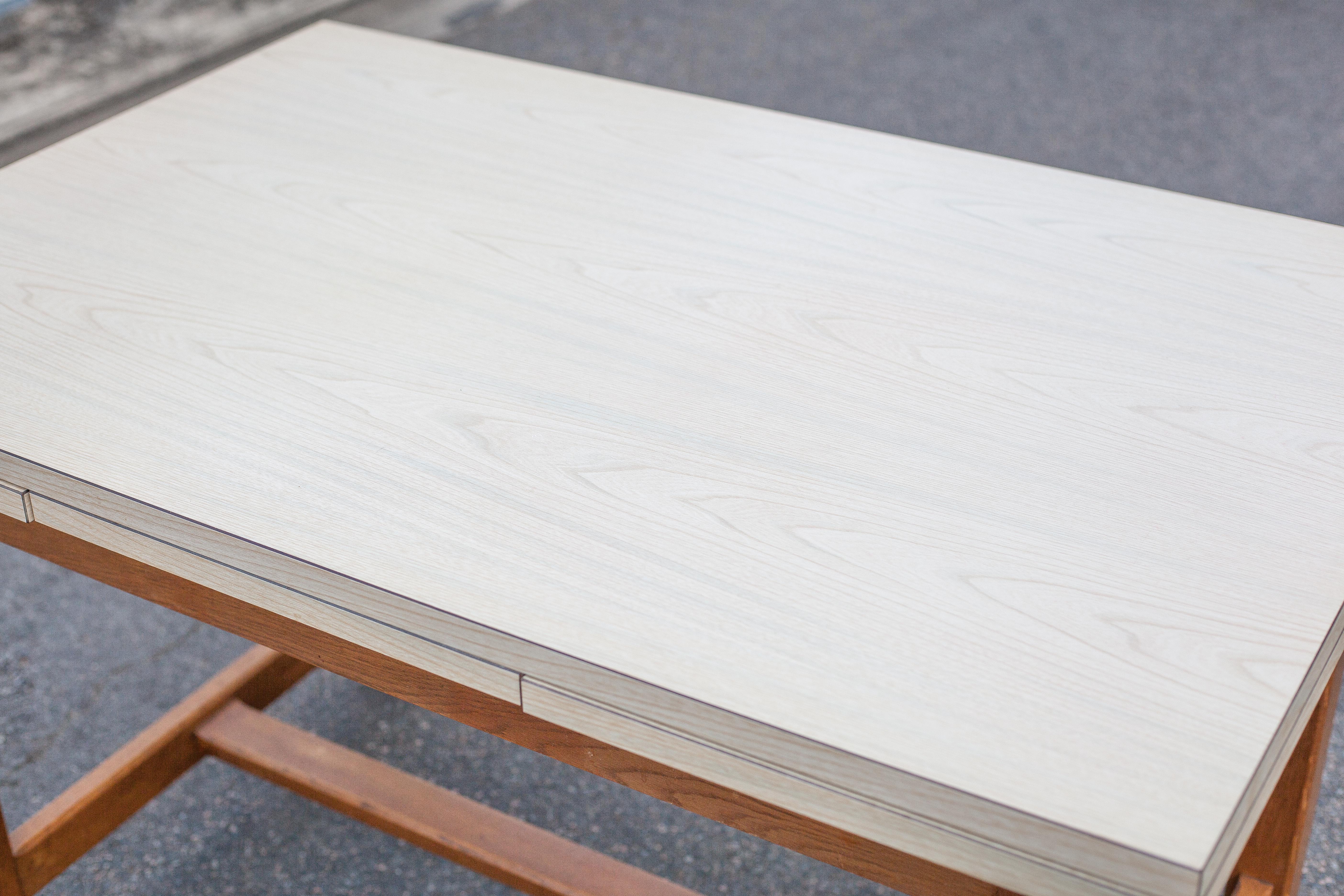 Wood and formica table with extensions