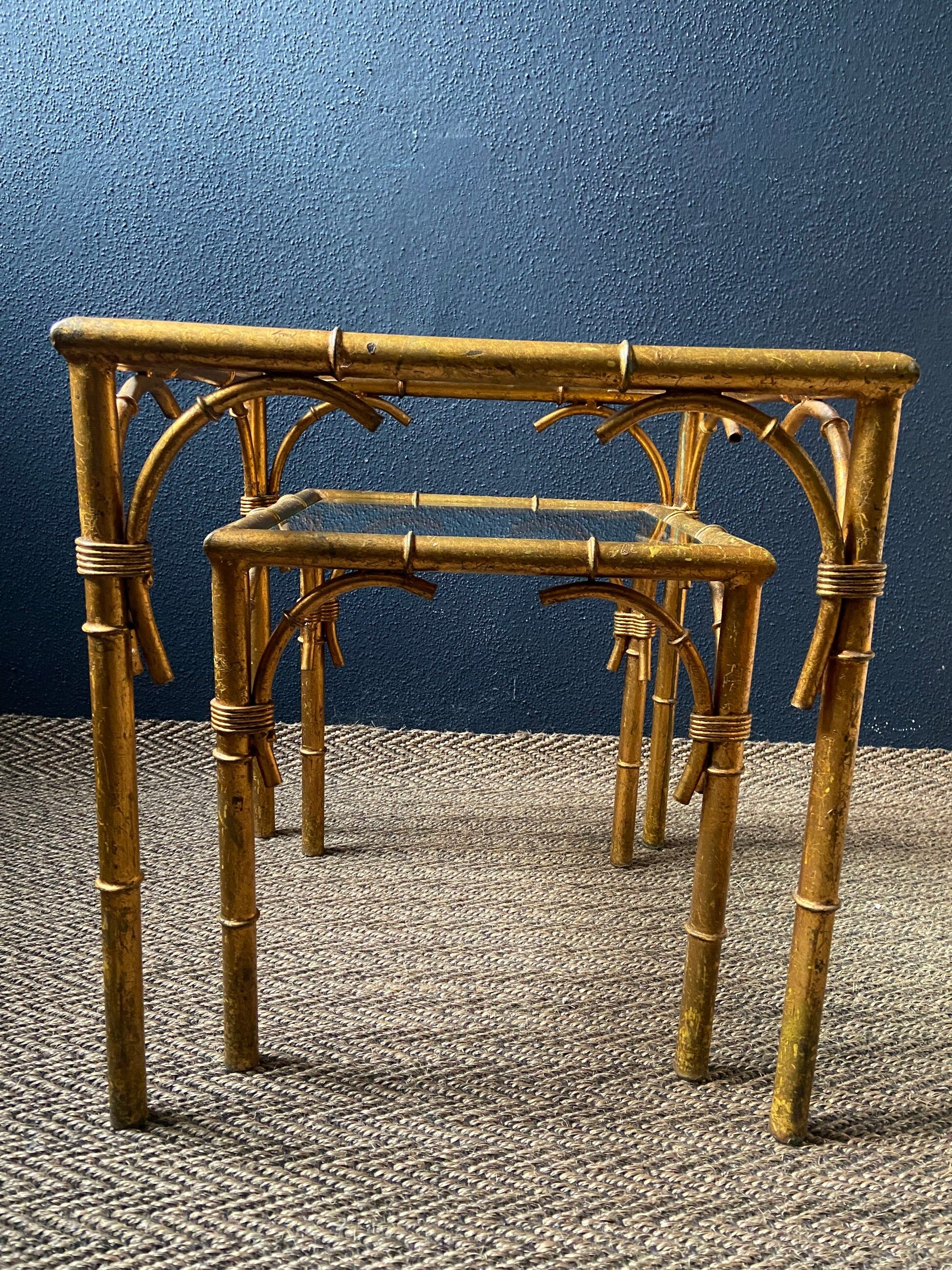 Pair of nesting tables in faux bamboo with glass tops, France, 1960s.