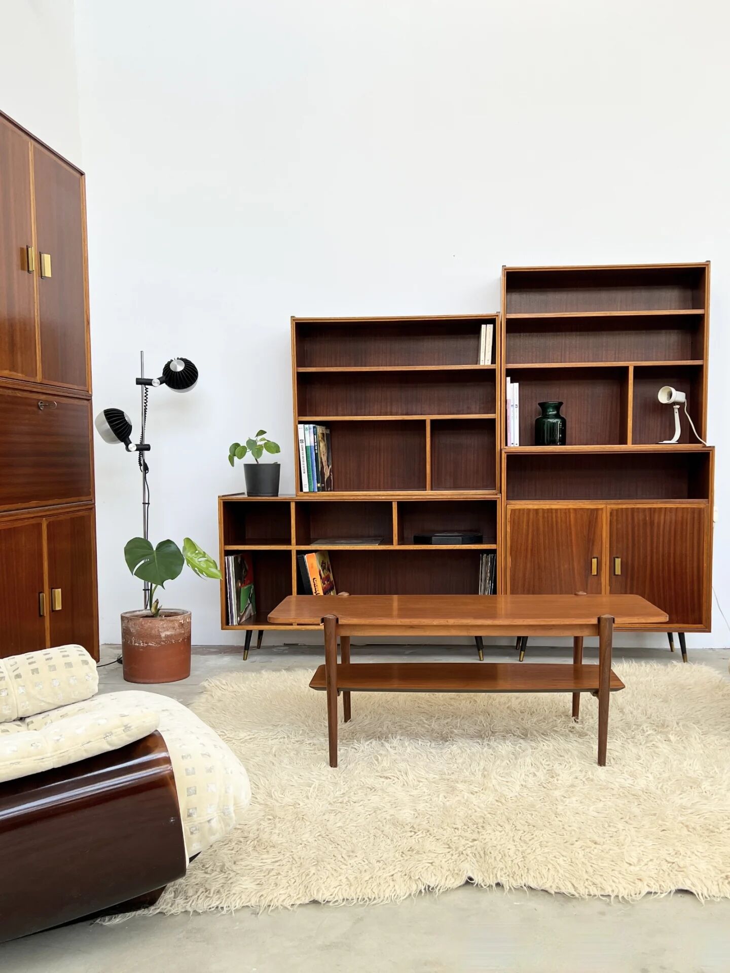 Mahogany library — closed storage and open cubbies, custom-made, 1960s.