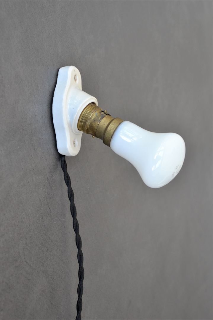 Oval porcelain hook to plug into socket