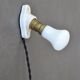 Oval porcelain hook to plug into socket