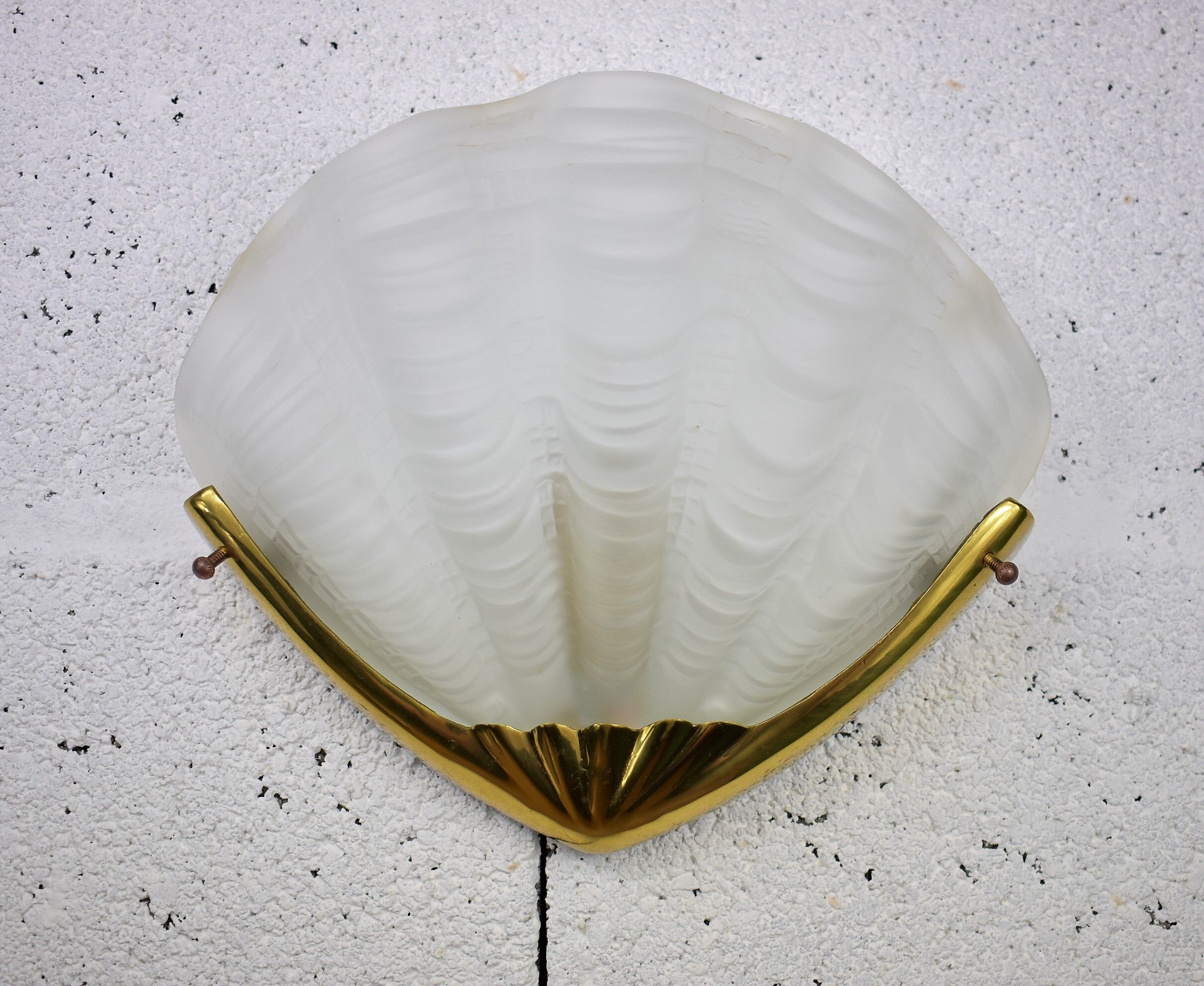 Applies shell shape, glass and brass.