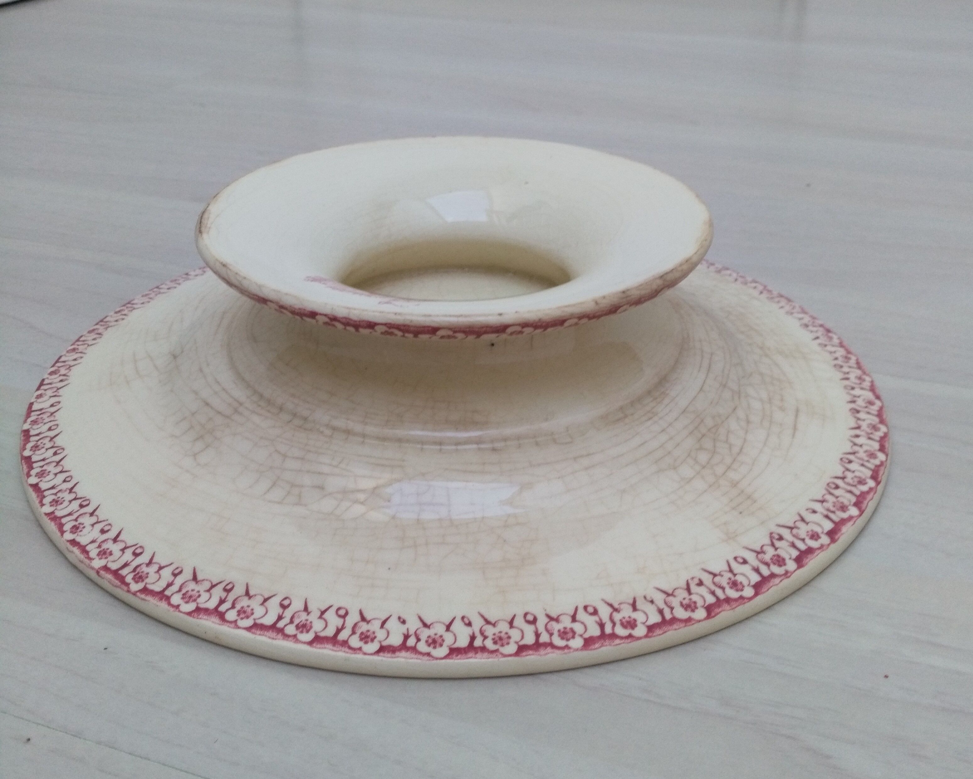 Cake dish on foot in iron earth of Gien model Pink hawthorn