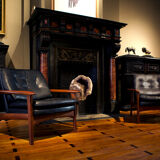 Pair of scandinavian armchairs in black leather and teak