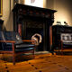 Pair of scandinavian armchairs in black leather and teak