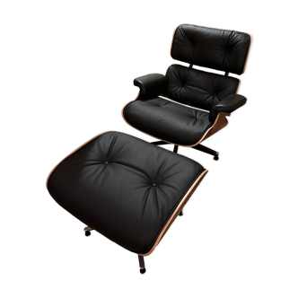 Charles Eames armchair and ottoman in rosewood and leather