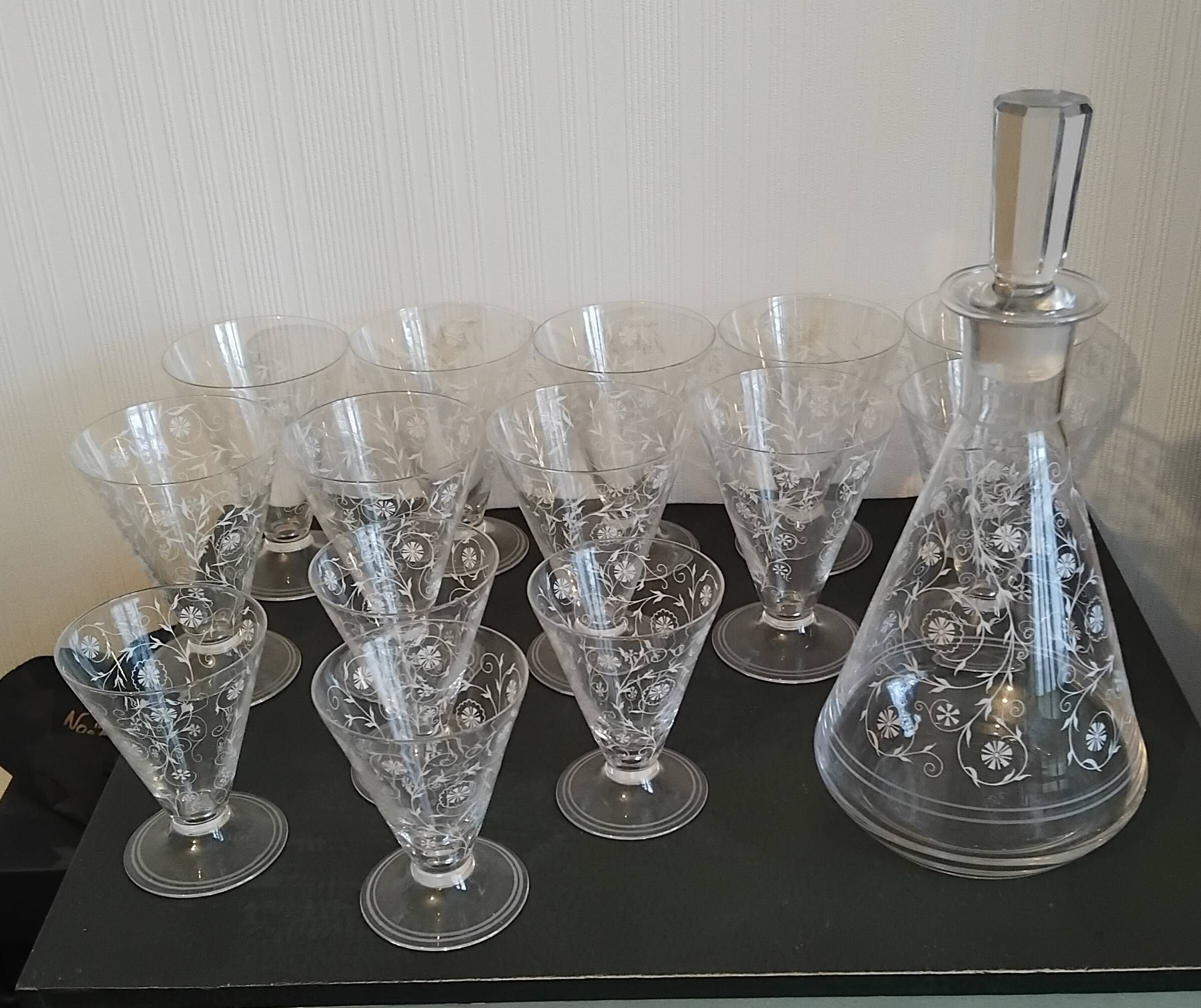 Set of 14 glasses and a carafe, 1960s.