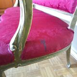 Louis XV style sofa in gilded wood and red pompadour fabric