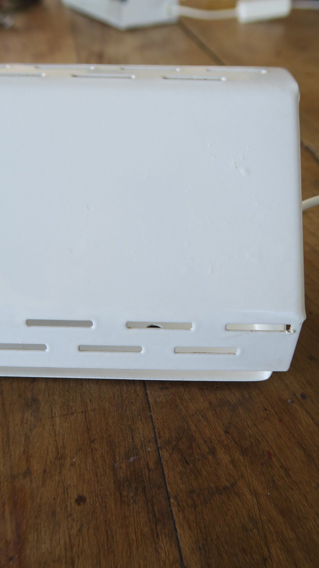 Wall lamp with red swivel shutter