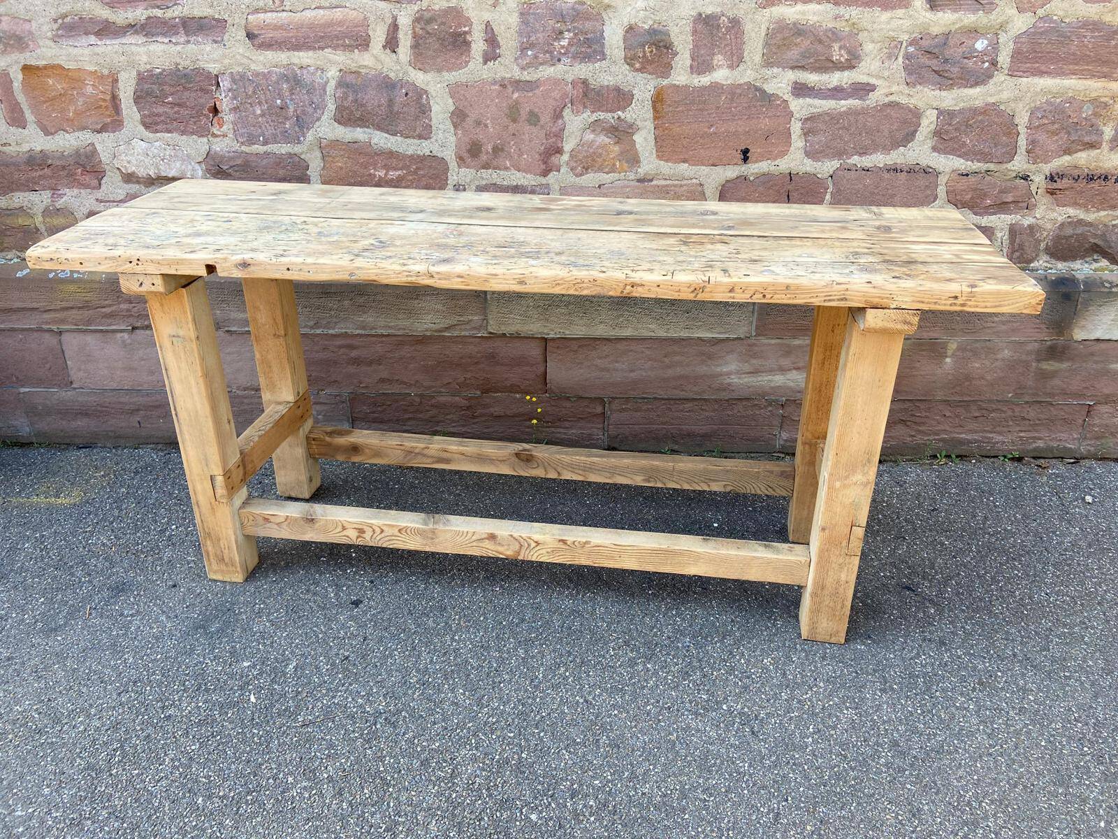 Primitive industrial table workbench in raw natural wood vintage bohemian trade store