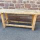 Primitive industrial table workbench in raw natural wood vintage bohemian trade store