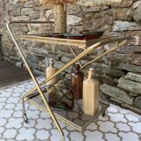 Golden dessert with wheeled glass tray